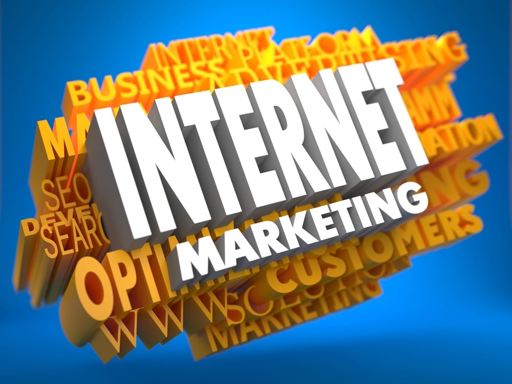 Internet Marketing on White Color on Cloud of Yellow Words on Blue Background. Business Concept.